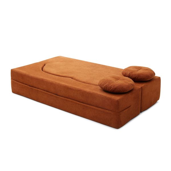 Brown fold-out sofa bed with round cushions