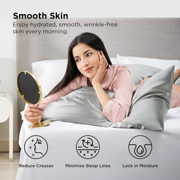 Woman admiring smooth skin in bed mirror