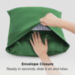 Hands fitting green pillowcase with envelope closure