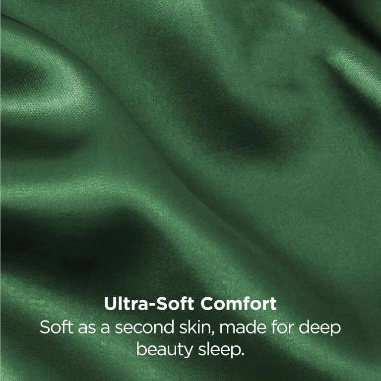 Close-up of green silky fabric with text overlay