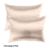 Two champagne pink satin pillowcases
