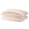 Two beige satin pillowcases stacked together