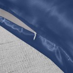 Close-up of blue cushion cover with white zipper