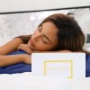 royal comfort mulberry soft silk hypoallergenic pillowcase twin pack 51 x 76cm navy Woman resting on silk pillowcase beside product box