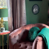 brighton throw 100% nz wool emerald Cosy pink armchair with green decor by window