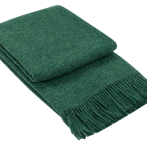 Folded green fringed throw blanket