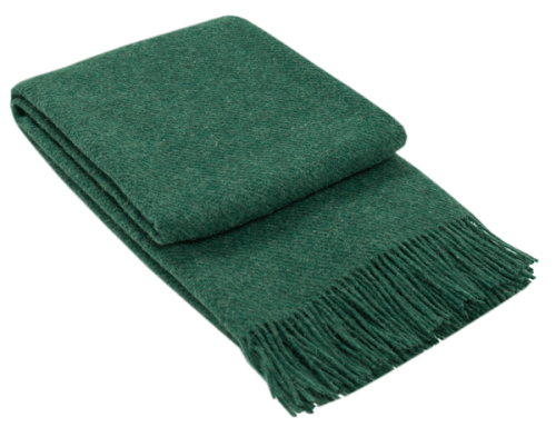 Folded green fringed throw blanket