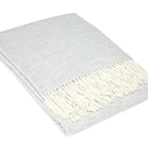 Light grey throw blanket with white fringe