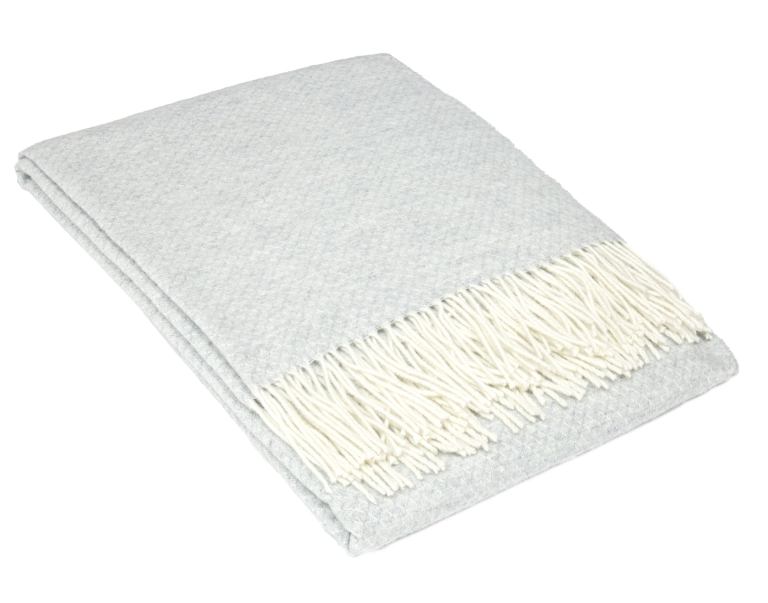 Light grey throw blanket with white fringe