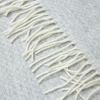 chiswick throw merino wool/cashmere light grey Close-up of fringed wool throw blanket
