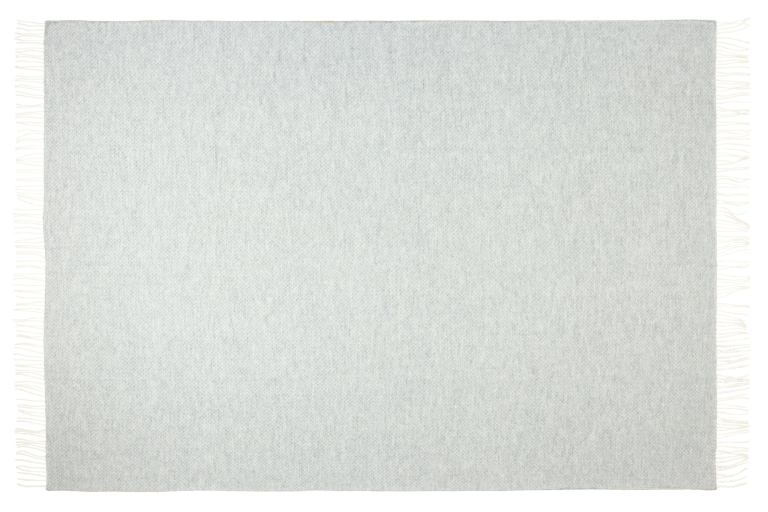 Light grey textured rug with fringe edges