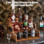carla home 3 tier liquor bottle display shelf rack bar organizer for whiskey, wine, coffee syrups, spirits & bottles Three-tier wooden stand displaying assorted liquor bottles