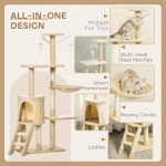Beige multi-level cat tree with hammock and toys