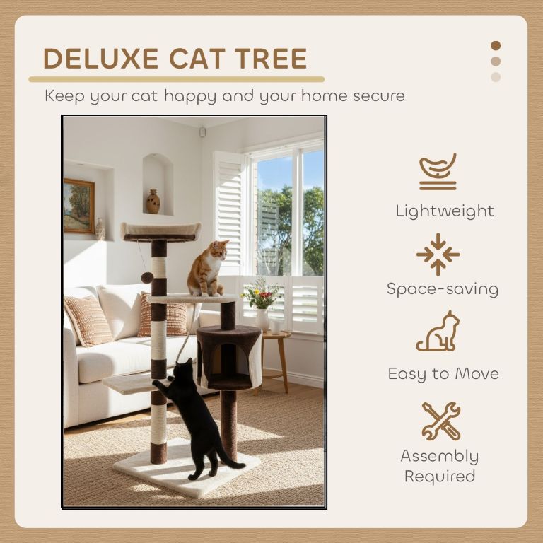 Two cats playing on deluxe cat tree indoors
