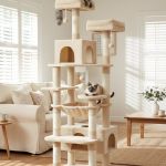 Two cats on tall beige cat tree