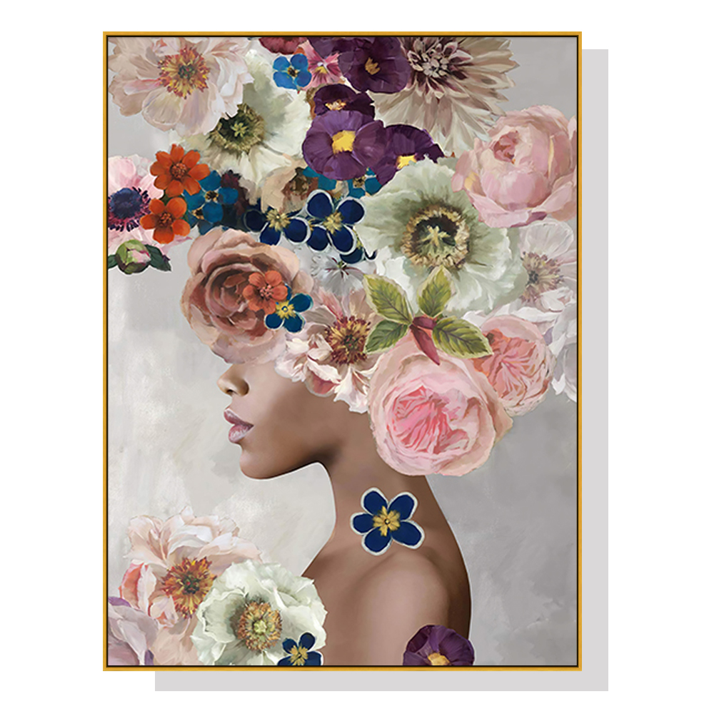 Artistic portrait of woman with vibrant floral headdress