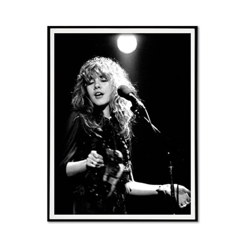 Black and white photo of singer on stage