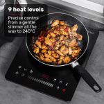eurochef induction benchtop cooktop, 2000w, 9 heat levels, fast electric portable cooker, touch controls with slider Induction cooktop with frying pan cooking stir fry