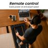 Man using remote on under-desk treadmill