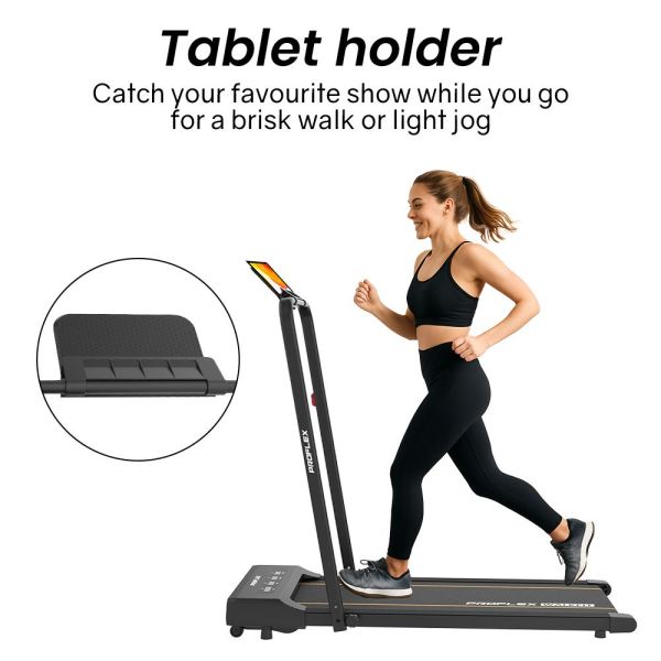 Woman jogging on treadmill with tablet holder