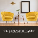 Two yellow armchairs with table and pendant light