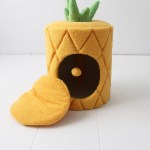 Pineapple-shaped plush cat cubby house with cushion