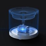 Futuristic transparent device with glowing cube inside