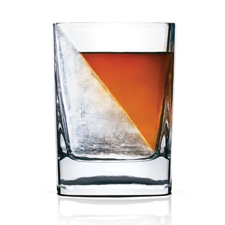 Whisky in tumbler with large triangular ice