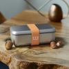 monbento mb sense bento box canyon Sleek metal lunchbox with orange strap on table