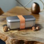 monbento mb sense bento box canyon Sleek metal lunchbox with orange strap on table
