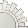 Sunburst-style round mirror with segmented frame