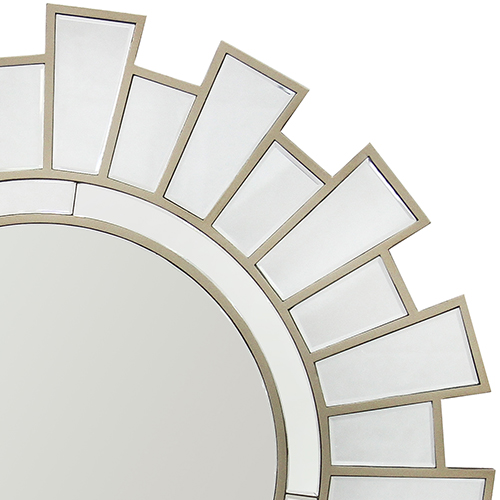 Sunburst-style round mirror with segmented frame