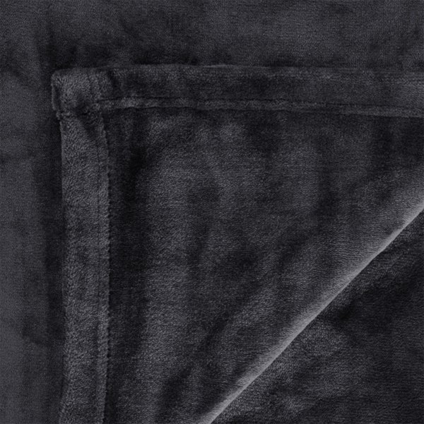 Close-up of dark grey plush blanket corner