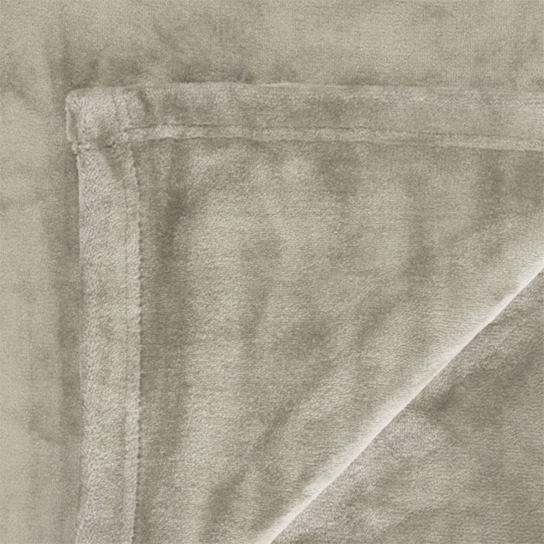 in 2 linen 350gsm plush ultra soft velvet touch blanket taupe double/queen Close-up of folded beige plush rug