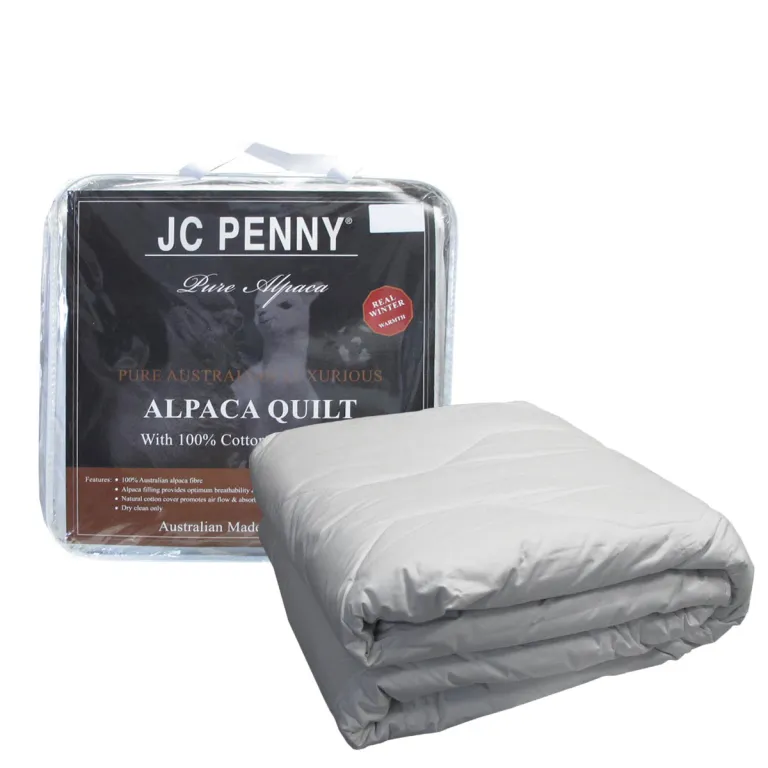 Folded alpaca quilt with JC Penney packaging