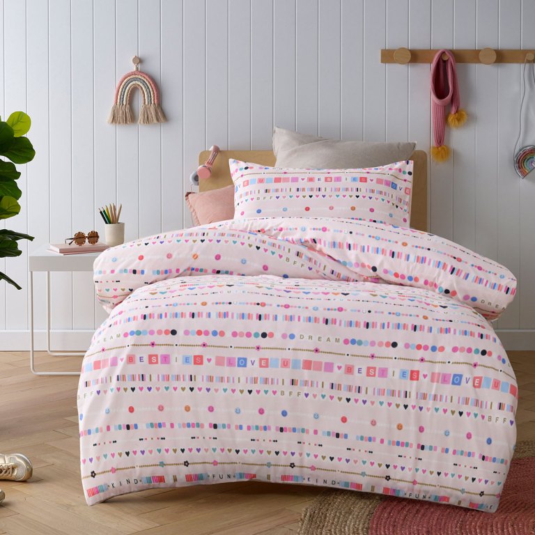 Pastel patterned kids bedding in modern bedroom