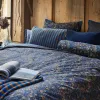pip studio tutti i fiori dark blue cotton quilt cover set queen Floral blue bedding with striped cushions in rustic bedroom
