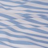 Blue and white striped fabric with soft folds