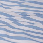 Blue and white striped fabric with soft folds