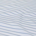 White fabric with thin blue stripes