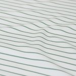 ardor frankie sage stripe yarn dyed reversible quilt cover set queen Close-up of white fabric with green stripes