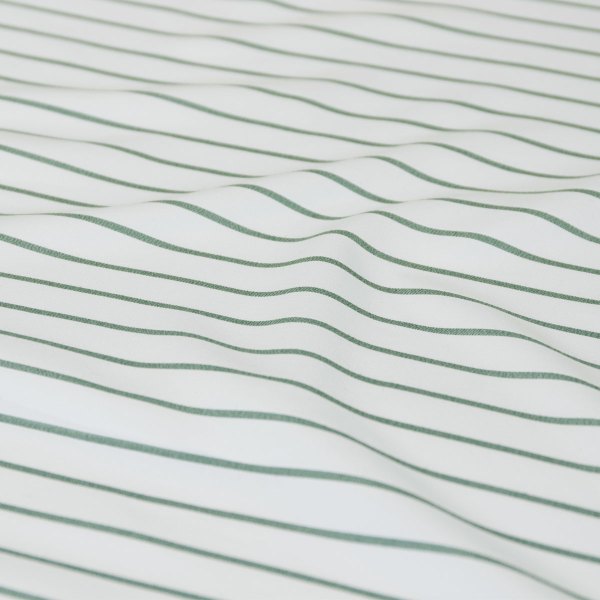 ardor frankie sage stripe yarn dyed reversible quilt cover set queen Close-up of white fabric with green stripes