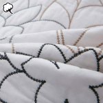 100% cotton coverlet set eliana queen Close-up of embroidered quilted white fabric