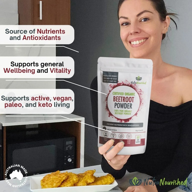 organic beetroot powder Woman holding certified organic beetroot powder pouch