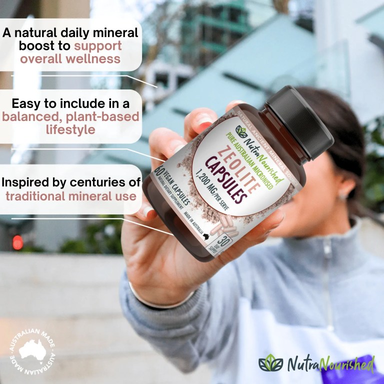 zeolite capsules Hand holding Australian zeolite supplement capsules bottle