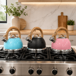 Three colourful kettles on modern gas stove