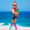 Child in colourful outfit posing on beach
