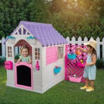 lifespan kids garden playhouse with pink fence Children playing with backyard cubby house and flowers