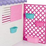 lifespan kids garden playhouse with pink fence Colourful toy playhouse wall with hanging planter boxes