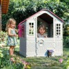 lifespan kids dolu playhouse (pink) Two children playing in backyard cubby house